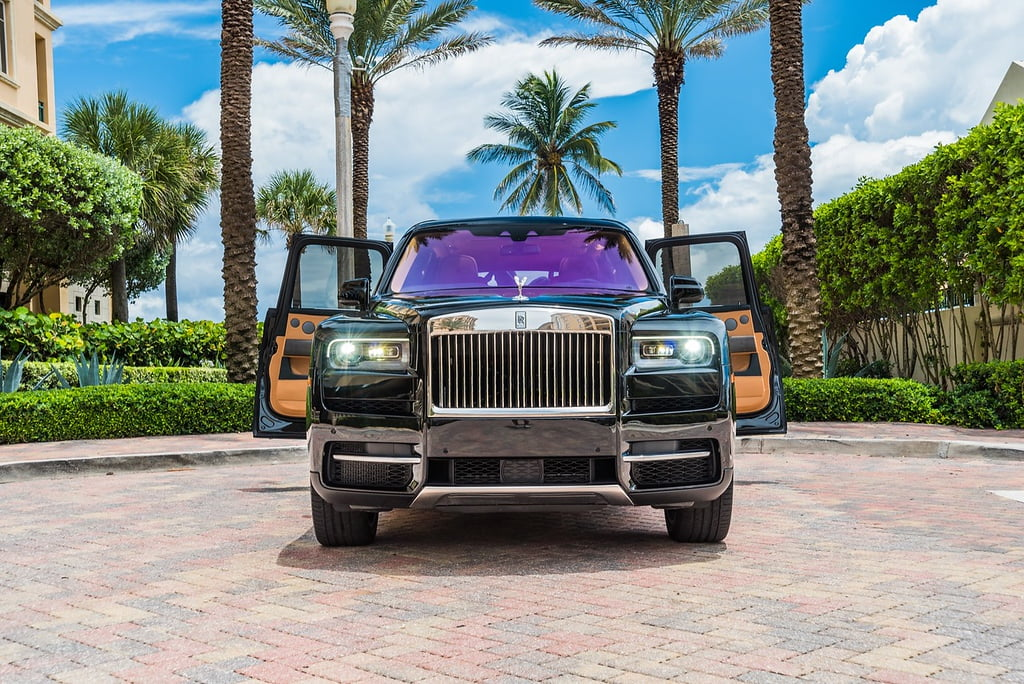 Rolls Royce Cullinan Black on Peanut Butter. Exotic Transportation Group